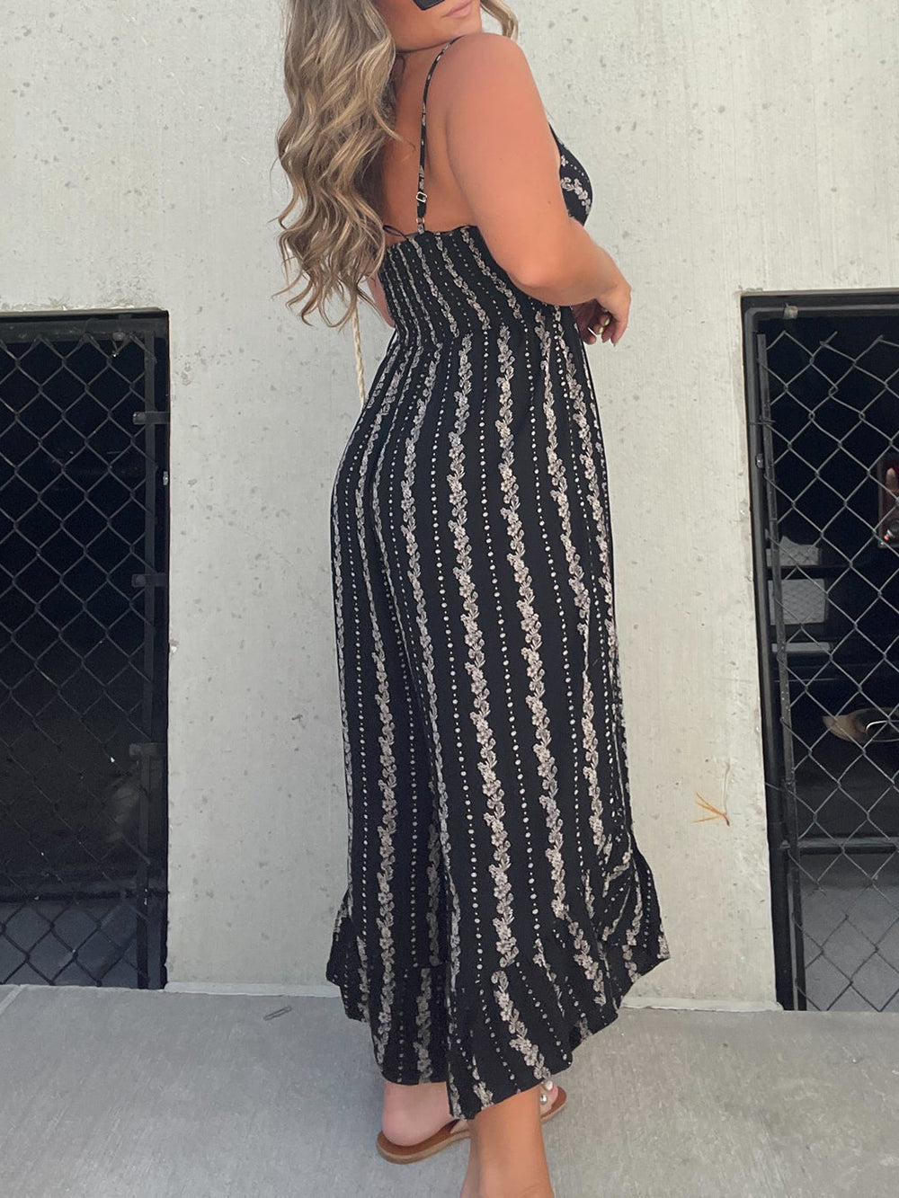 Women's black halter V-neck wide-leg jumpsuit — full length