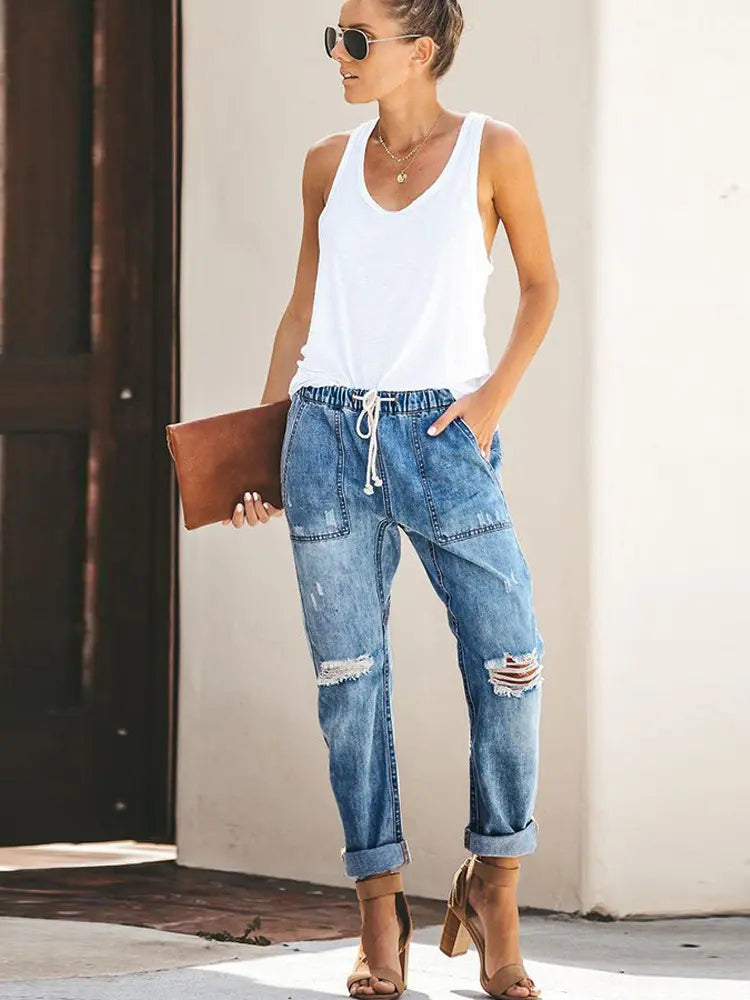 Women's Blue Ripped Denim Joggers — side detail