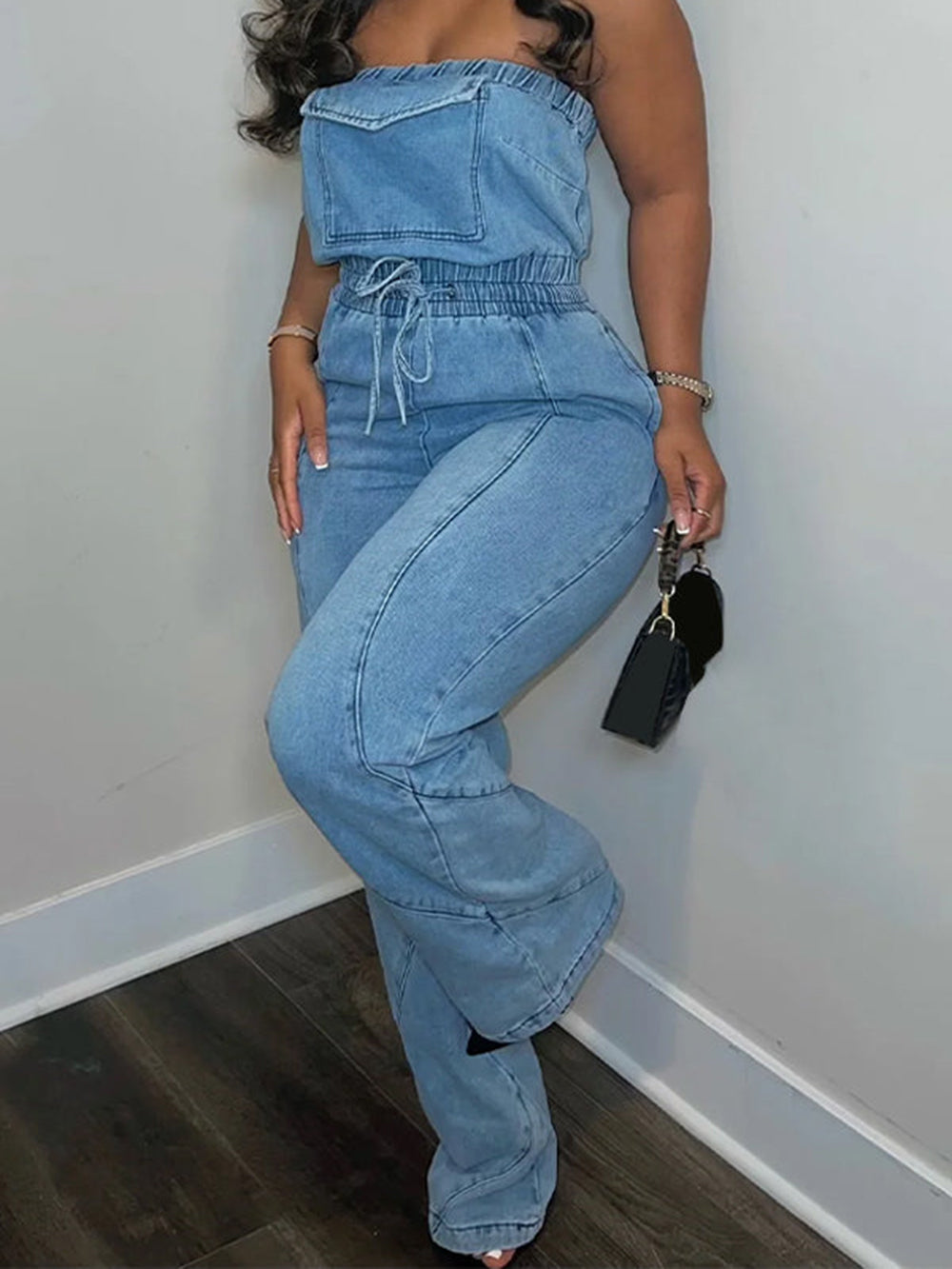 Women's blue denim jumpsuit — front detail