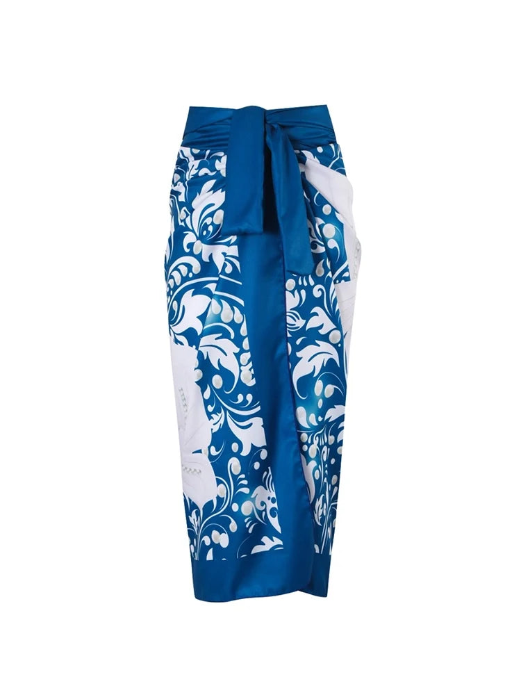 Women's blue floral pearl swimsuit set — back view