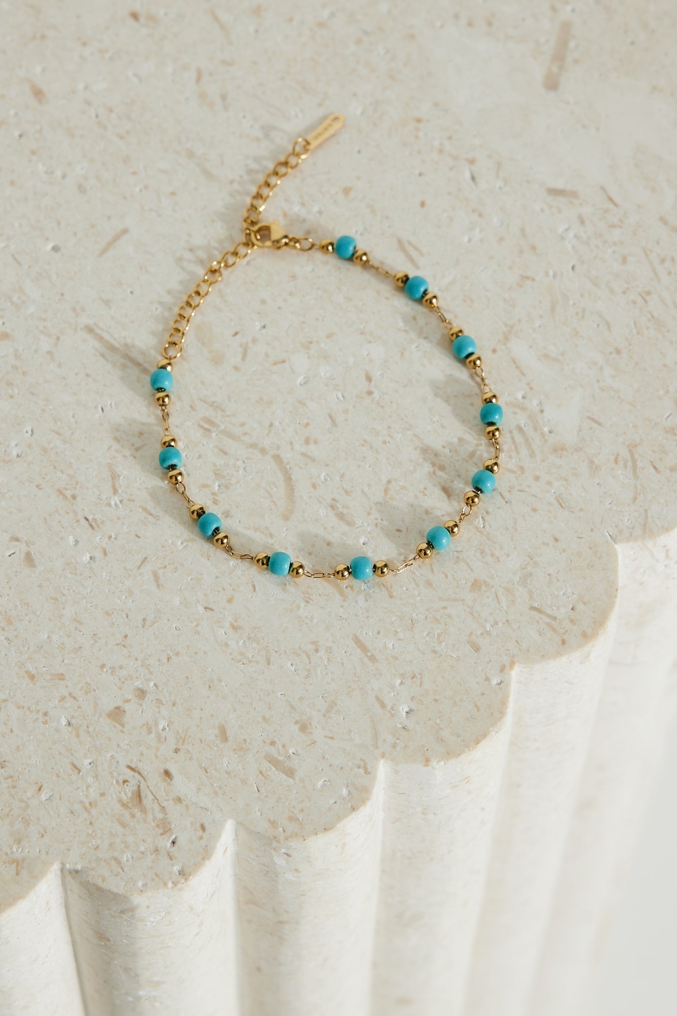Women's blue and gold beaded bracelet