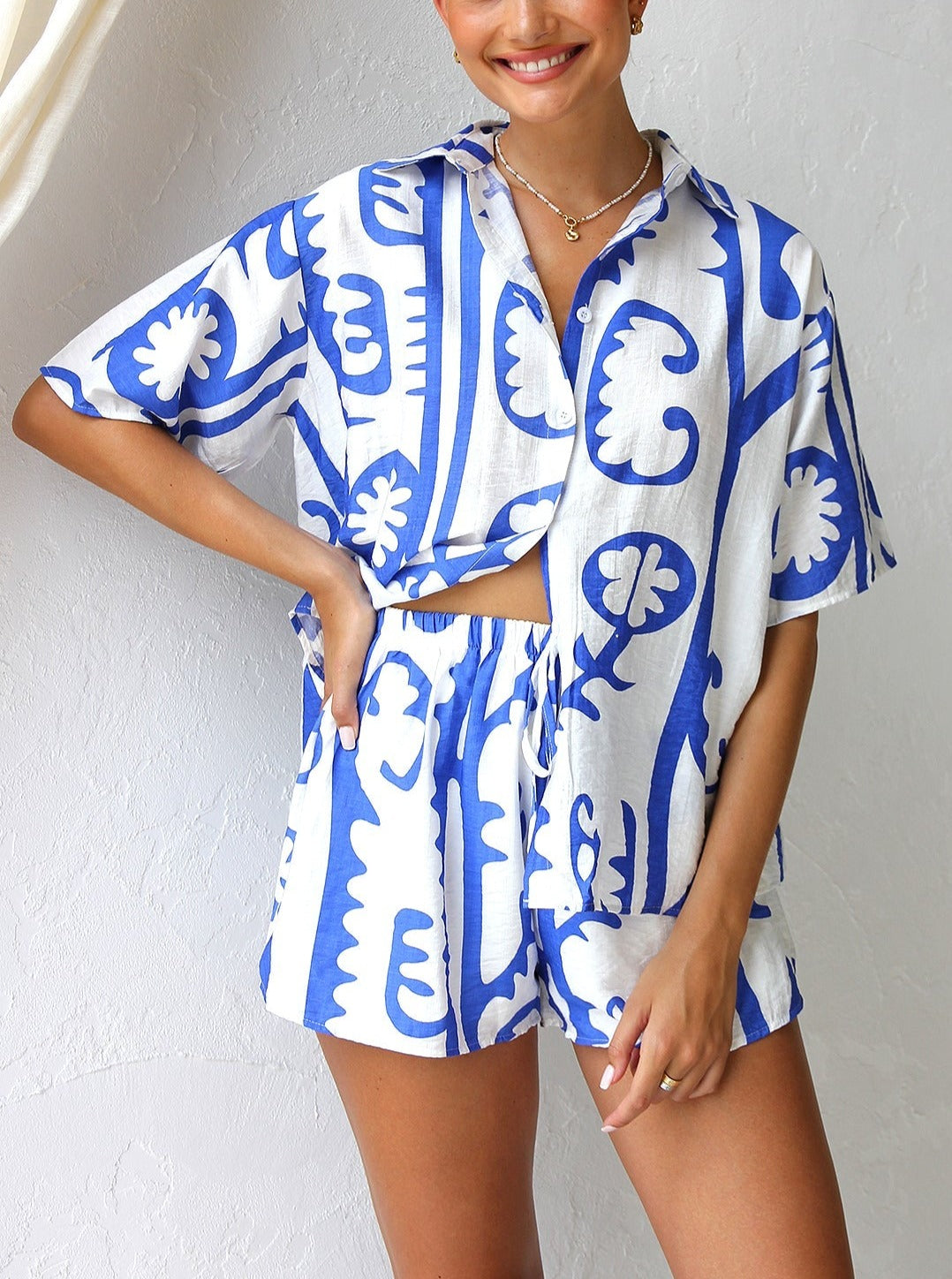 Women's blue contrast print shirt and shorts set — fabric detail