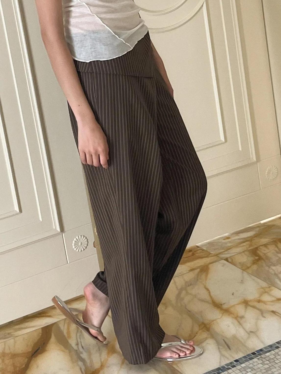 Women's brown folded overlay straight-leg trousers — styling detail