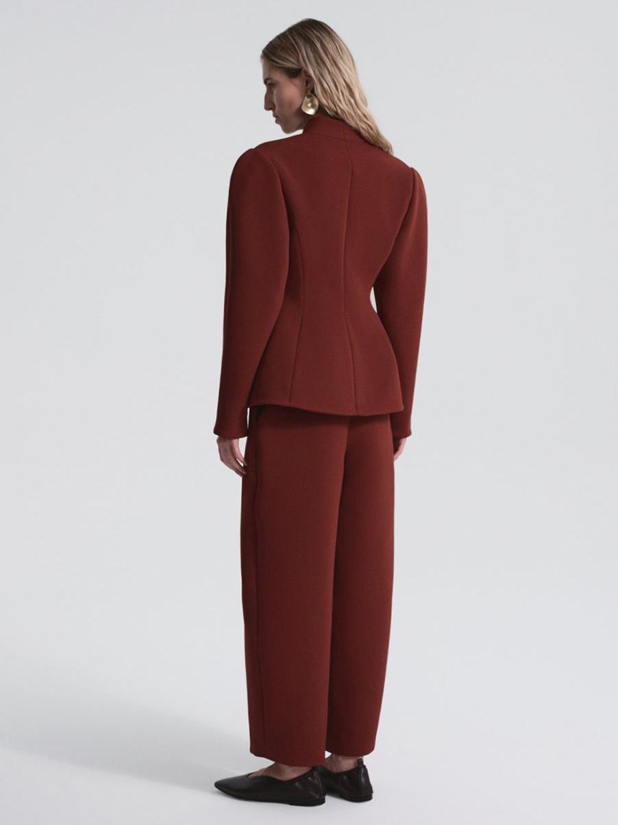 Women's burgundy peplum blazer and trousers set — side view