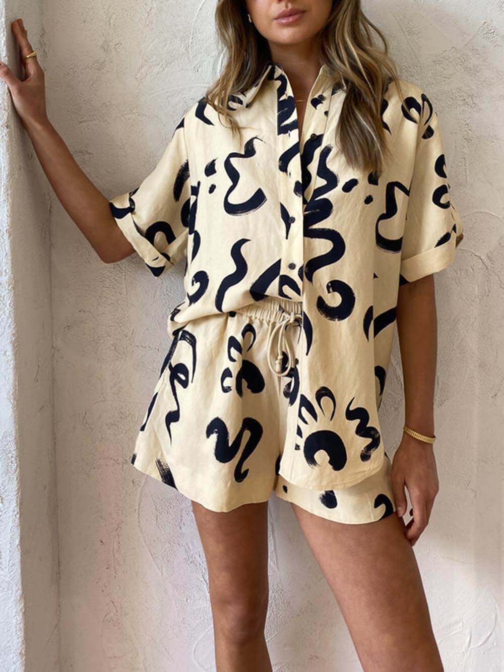 Women's coral sun print shirt and shorts co-ord set