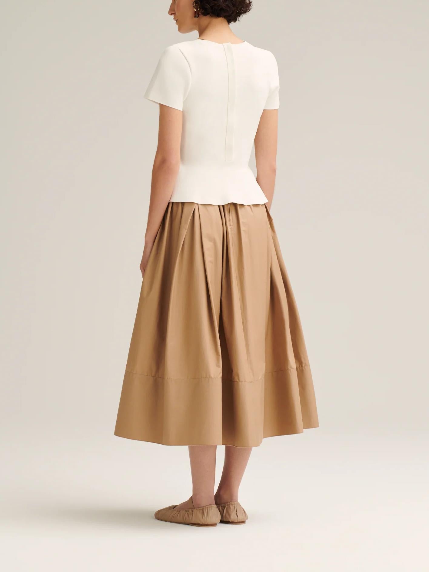 Women's cream crepe knit cravat top, close-up detail