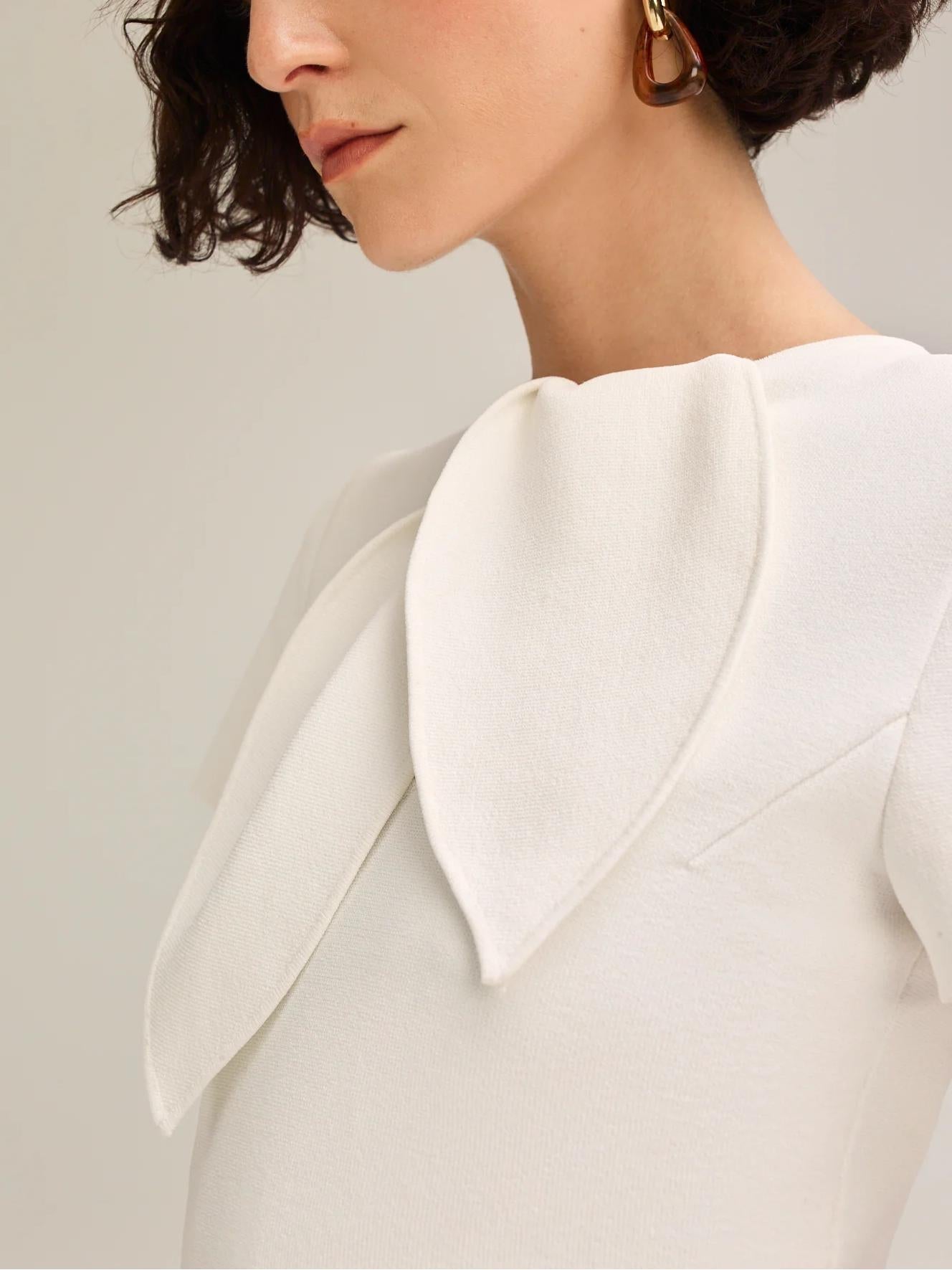Women's cream crepe knit cravat top, styled outfit