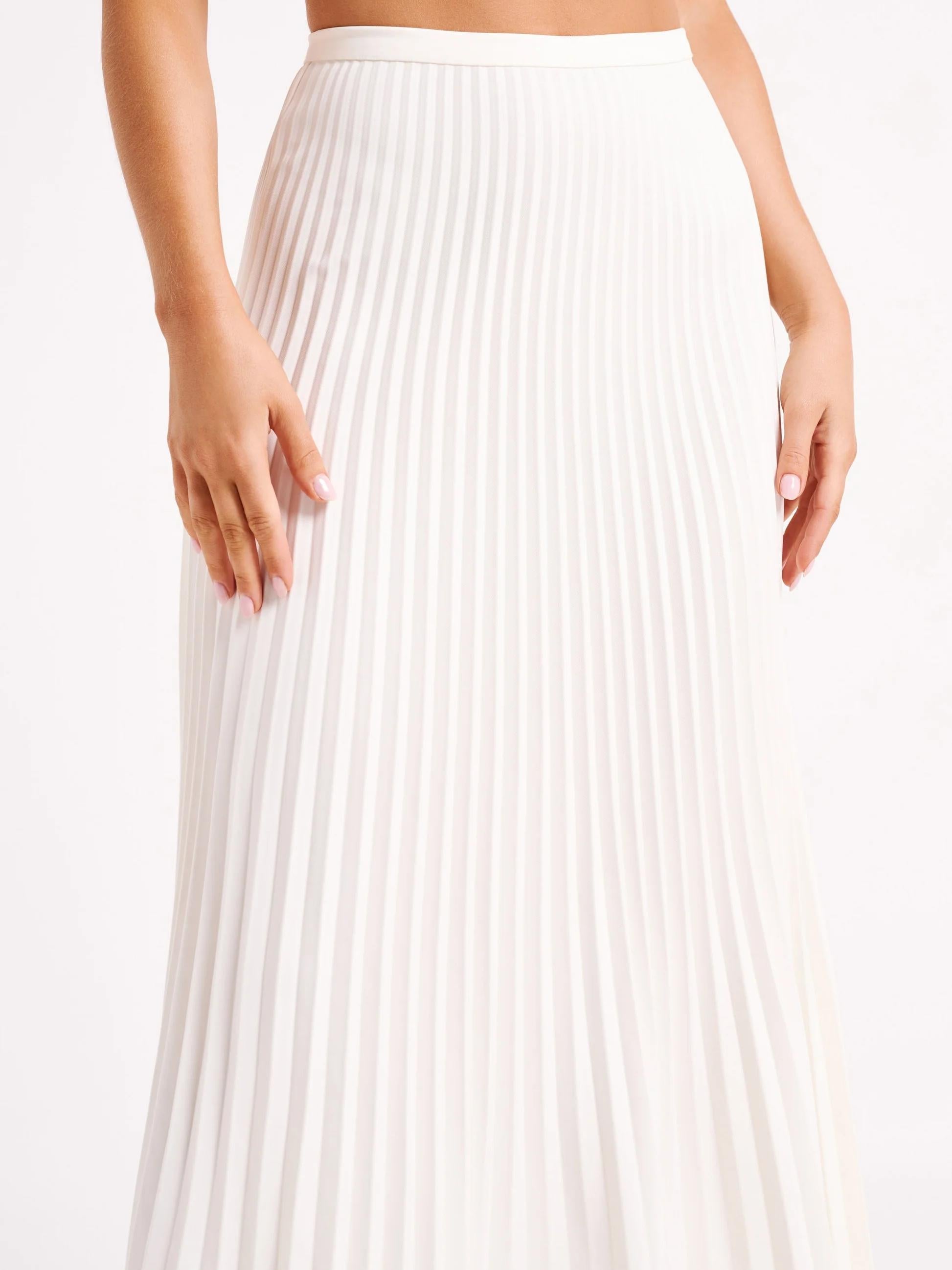 Women's cream cravat top and pleated maxi skirt set, full length