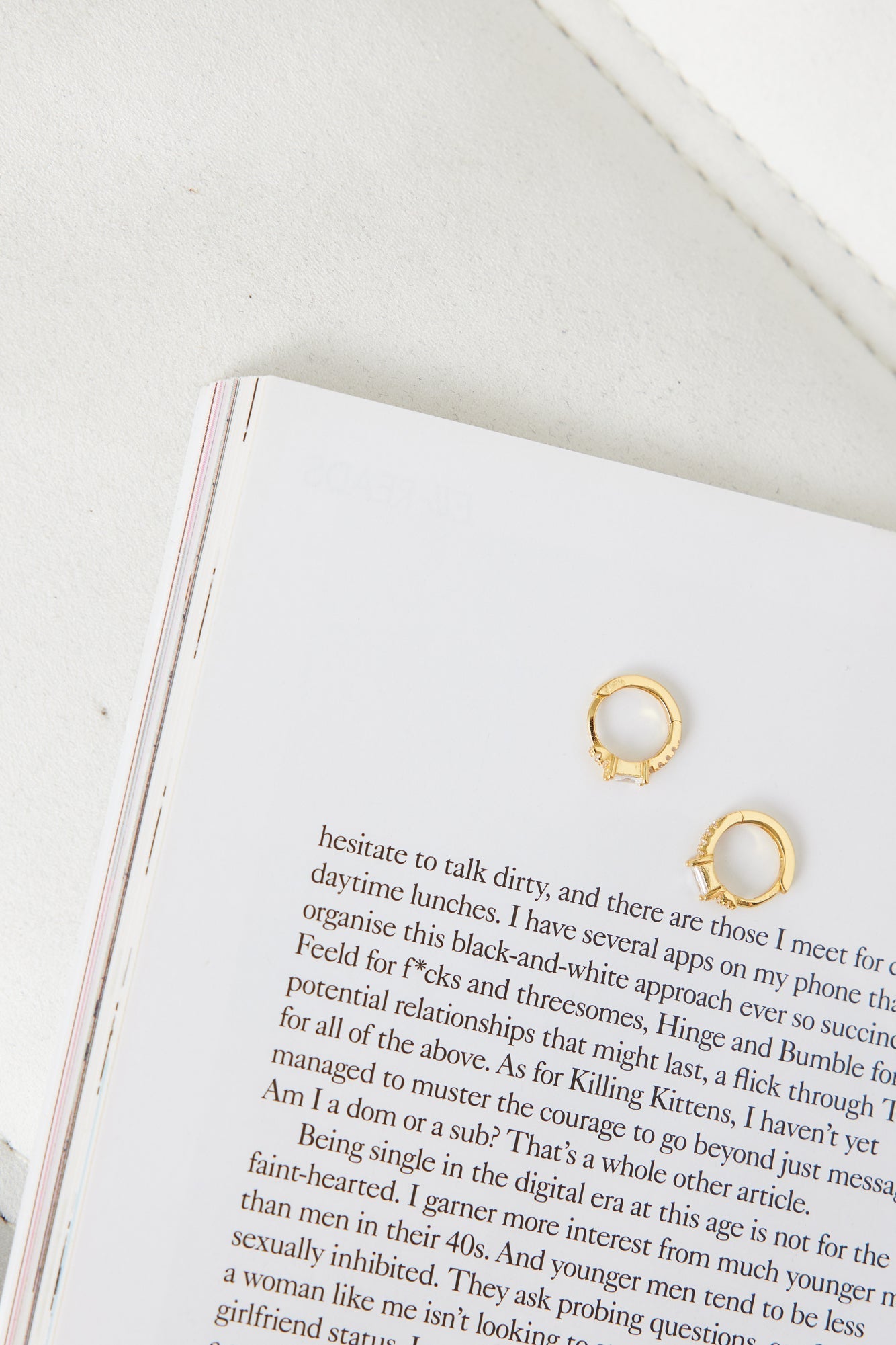 Women's gold cubic zirconia hoop earrings — alternate angle