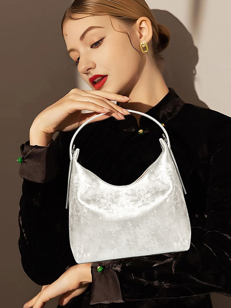 Women's dumpling-shaped leather crossbody handbag