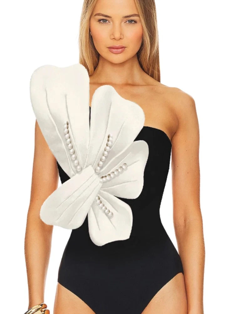 Women's flower embellished swimsuit set — back view