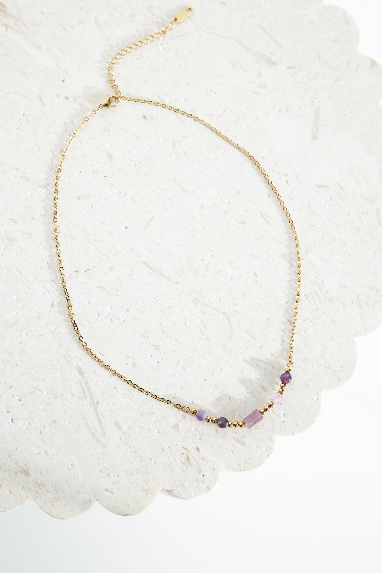 Women's gold beaded necklace