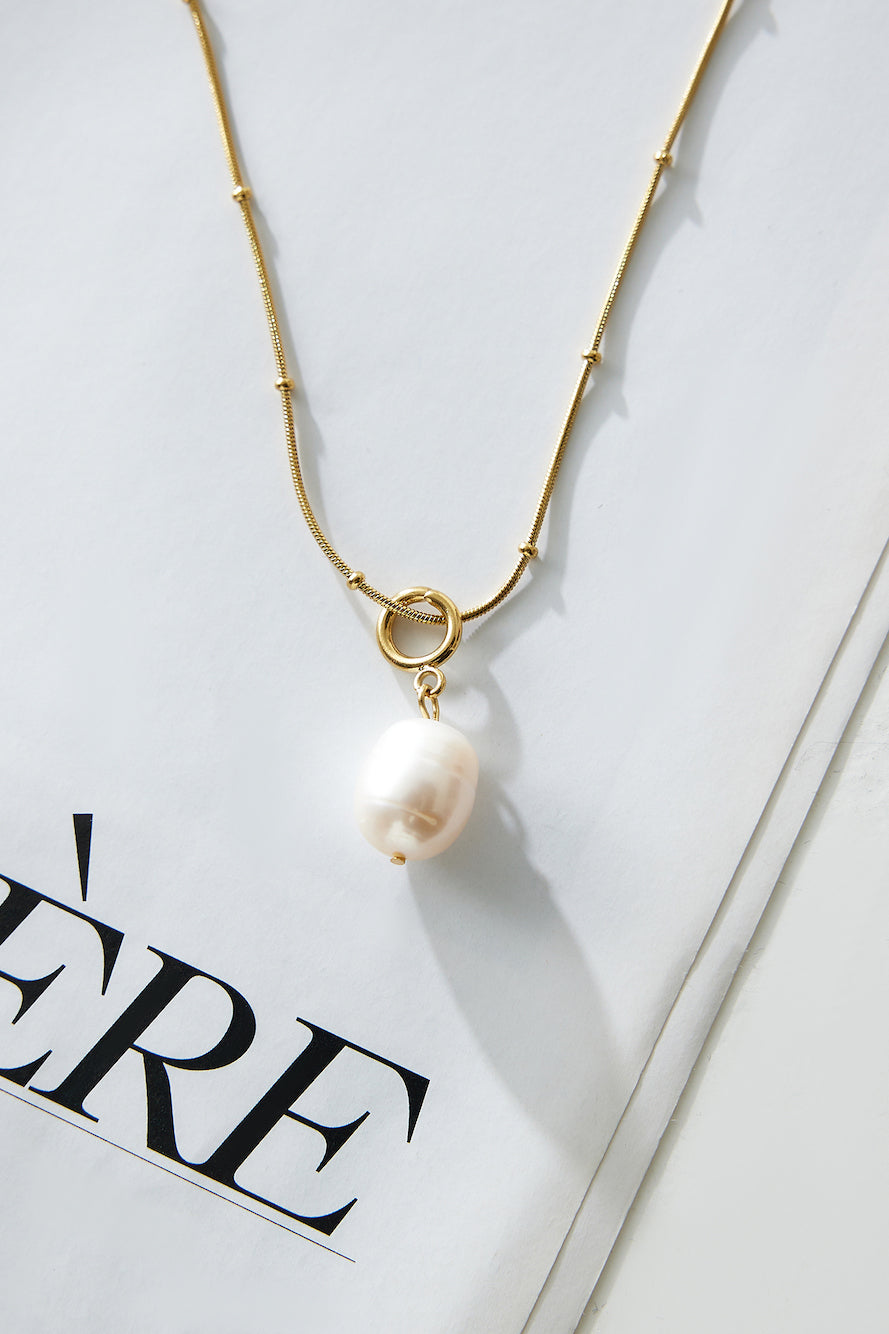 Women's gold chain pearl pendant necklace — alternate angle