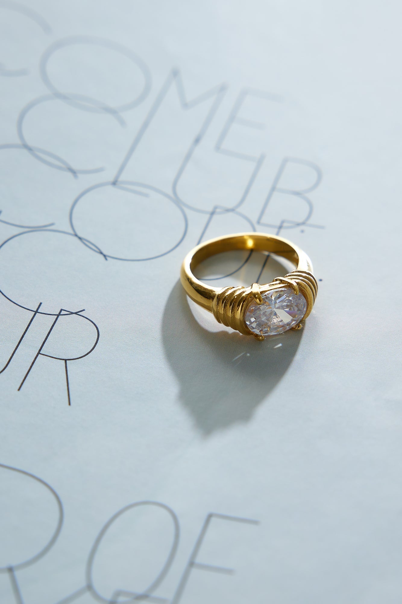 Women's gold cubic zirconia statement ring — detail view