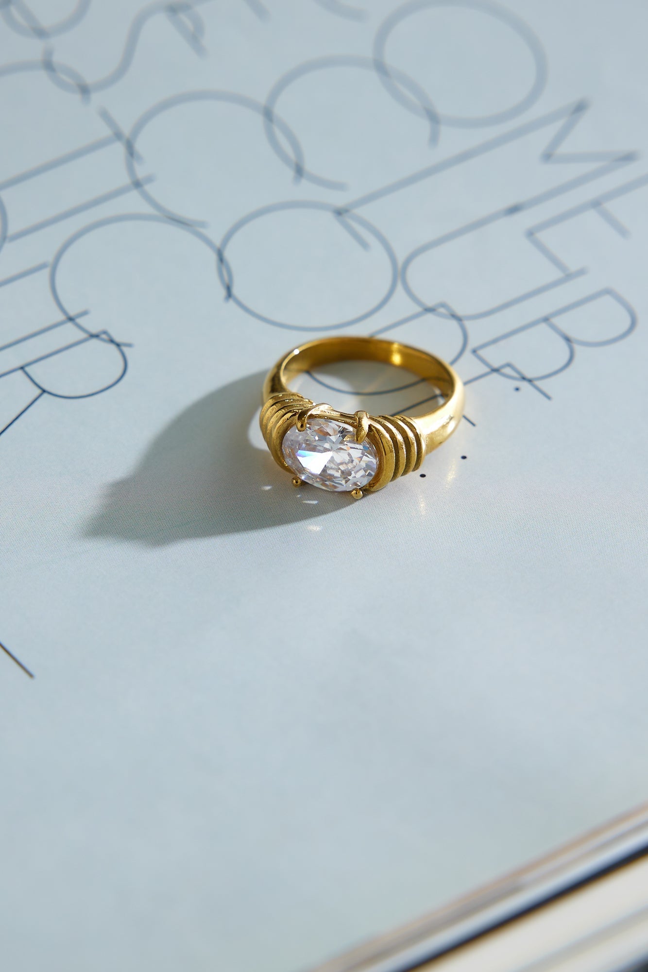 Women's gold cubic zirconia statement ring — alternate angle