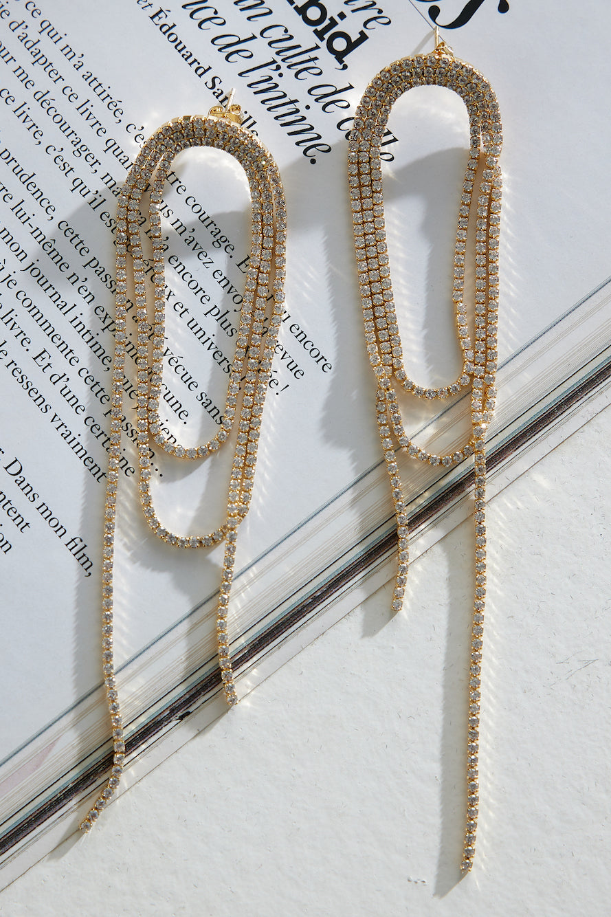 Women's gold diamante fringe earrings — detail shot