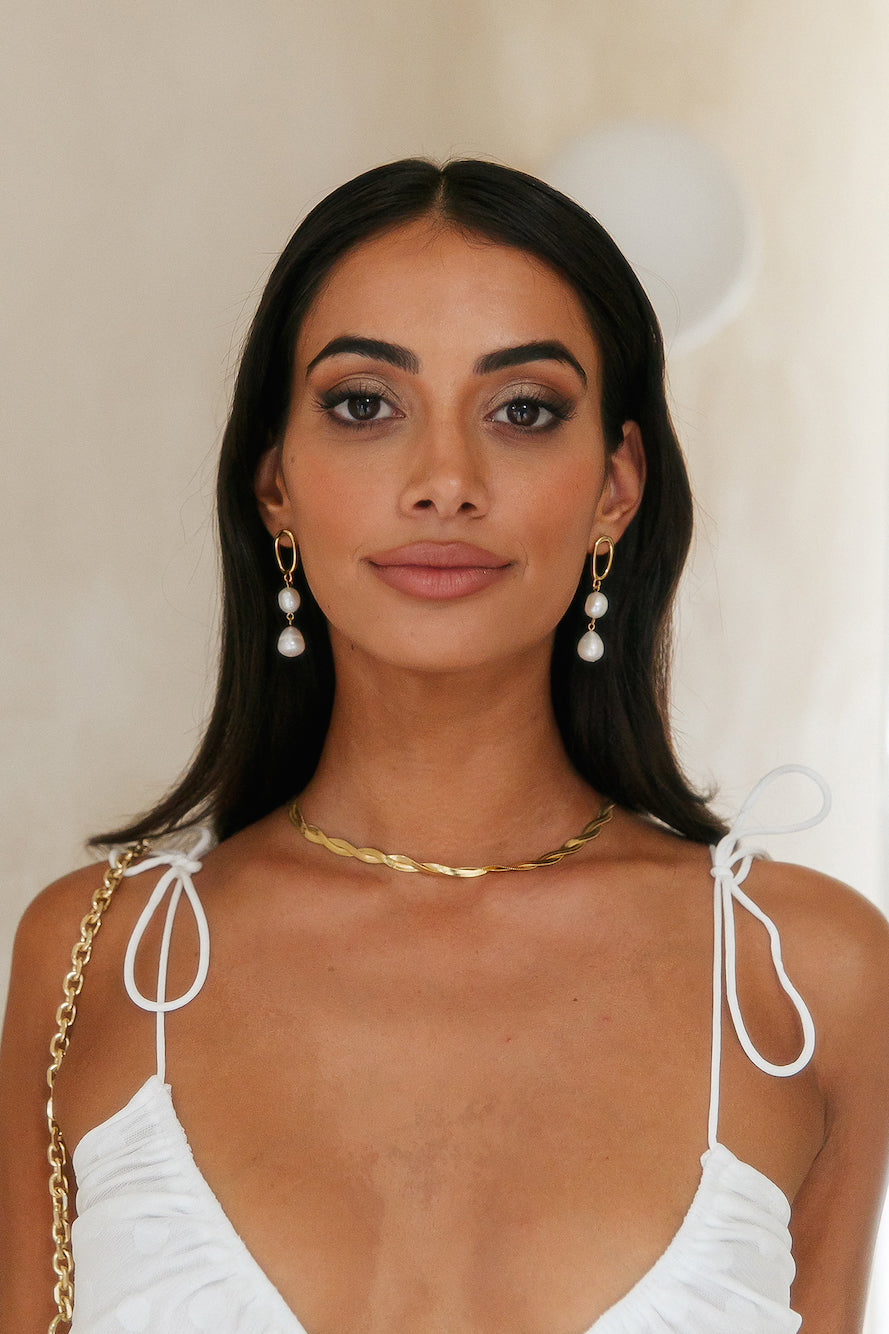 Women's gold double pearl drop earrings