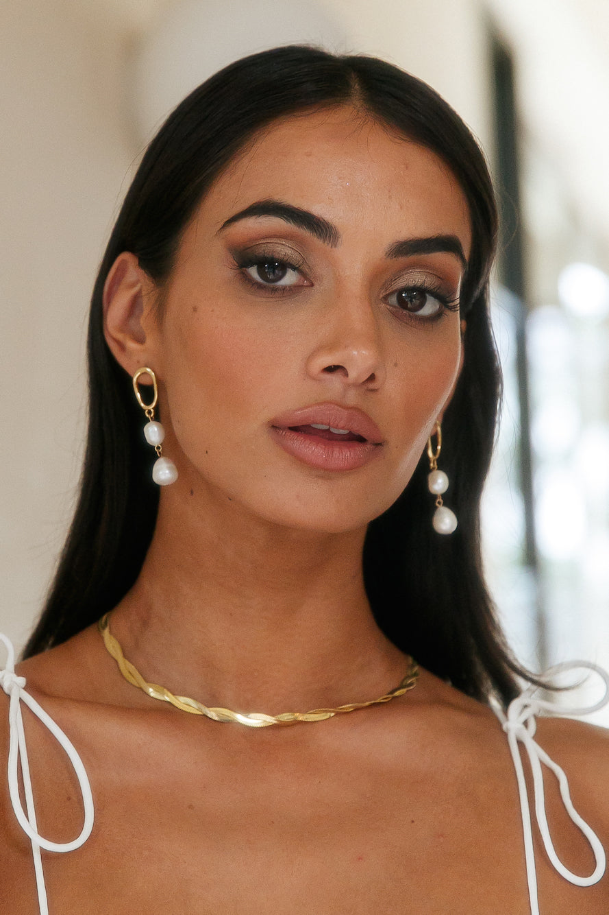 Women's gold double pearl drop earrings