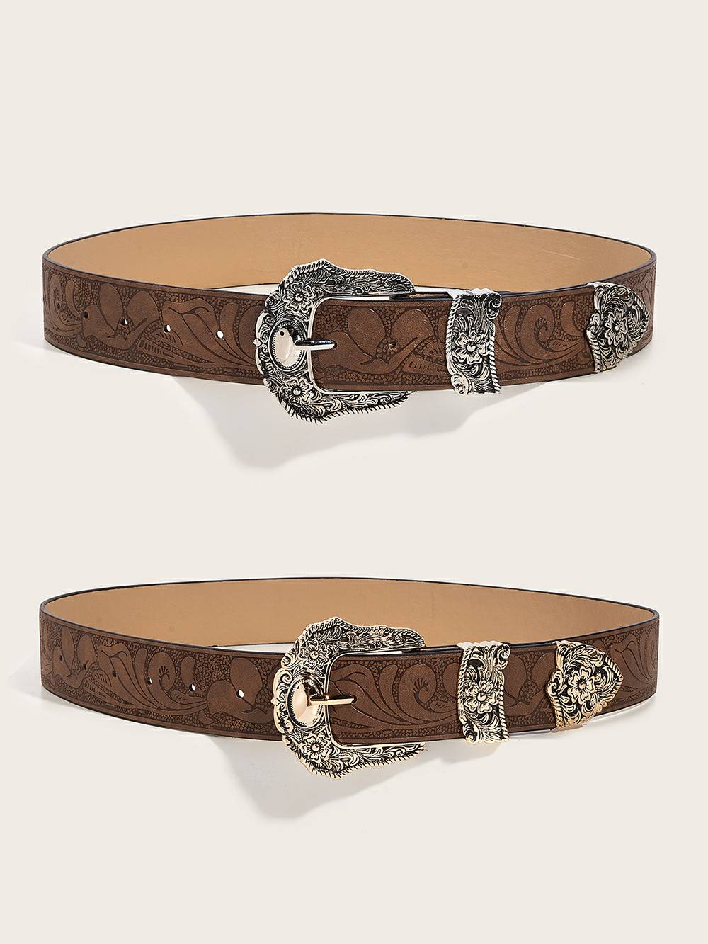 Women's gold floral tooled leather belt — buckle detail