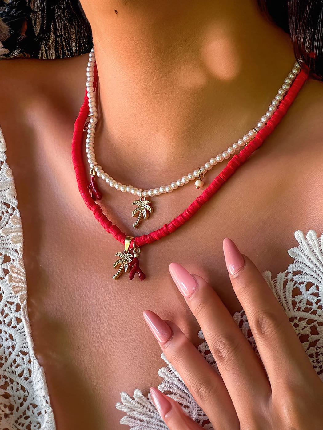 Women's gold layered pearl beach necklace — side detail