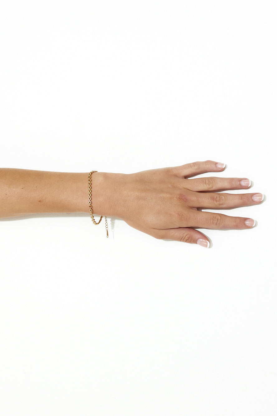 Women's gold link chain bracelet — alternate angle