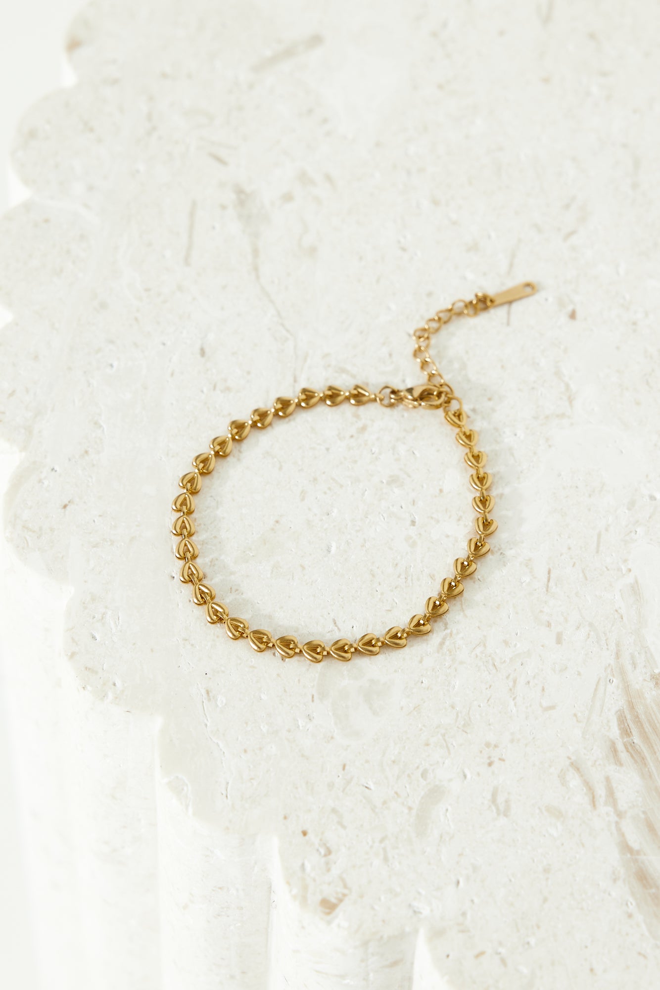 Women's gold link chain bracelet — alternate angle