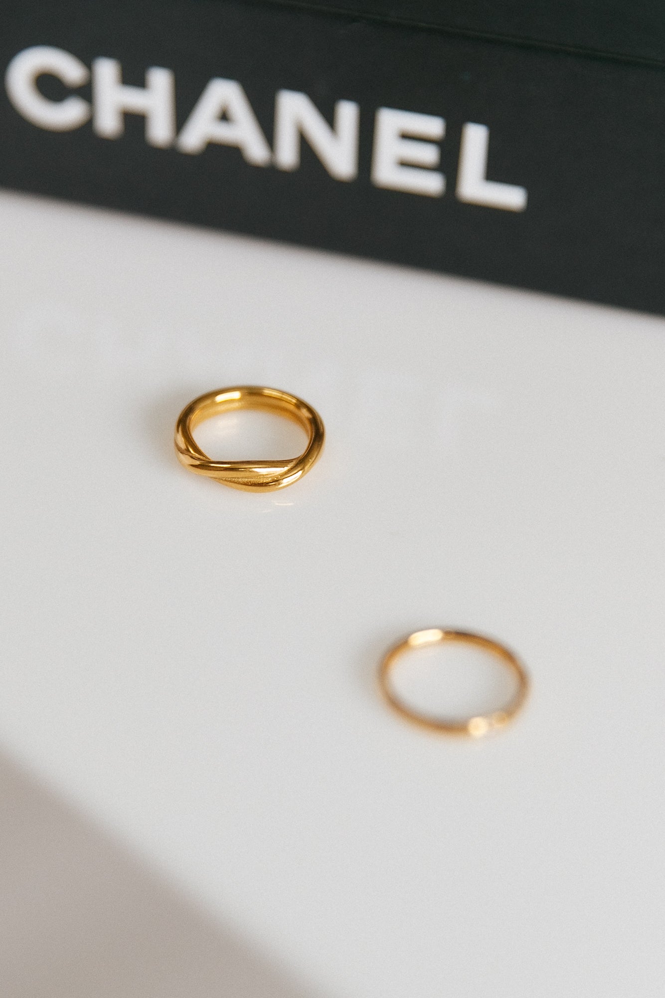 Women's gold-plated twist band ring — alternate angle