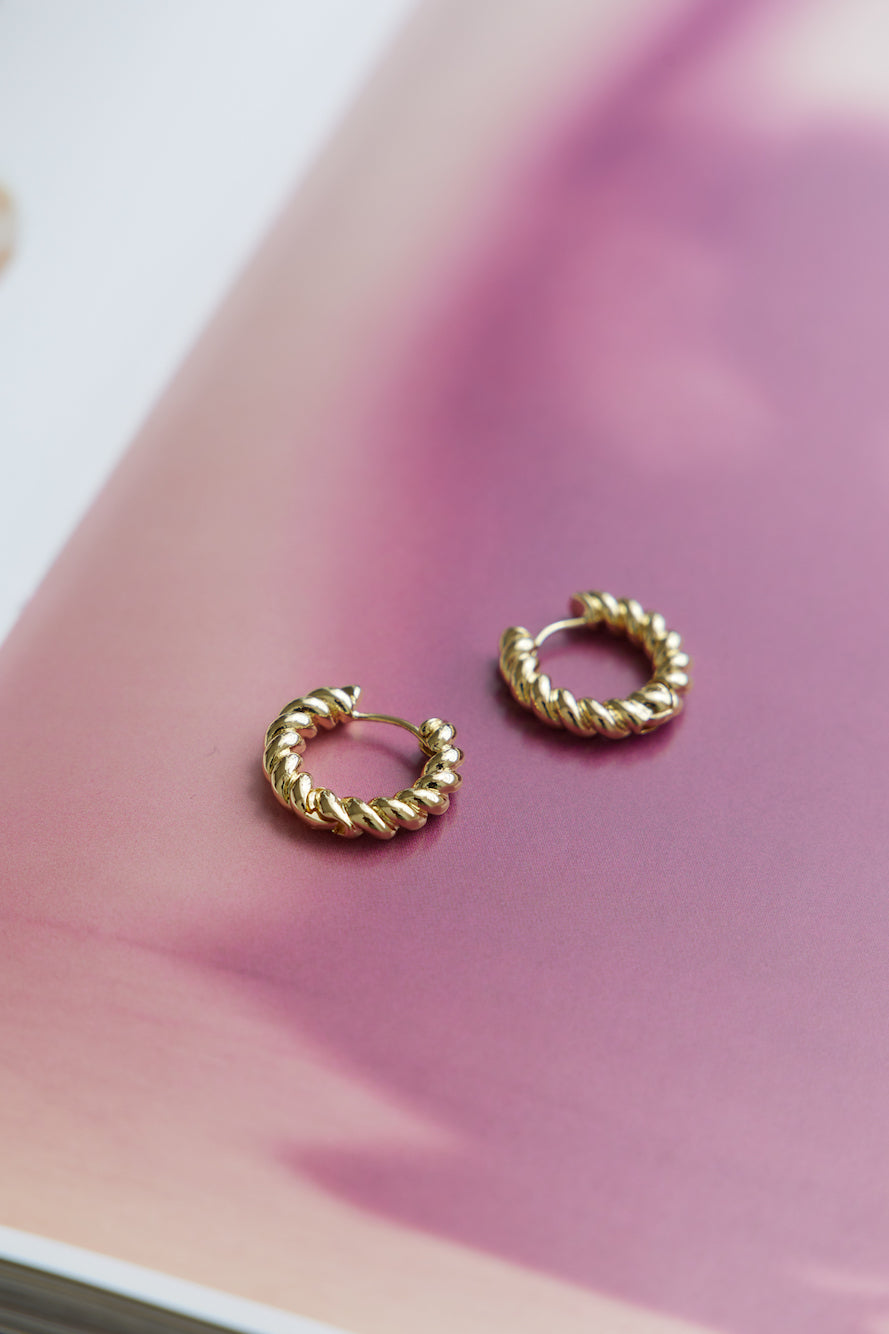 Women's gold-plated twist hoop earrings — alternate angle