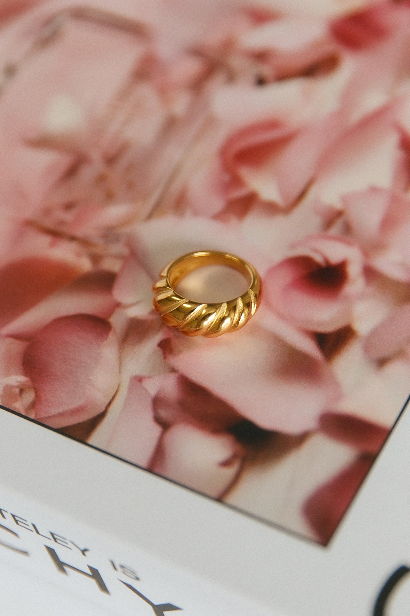 Women's gold-plated twist stacking ring — alternate angle