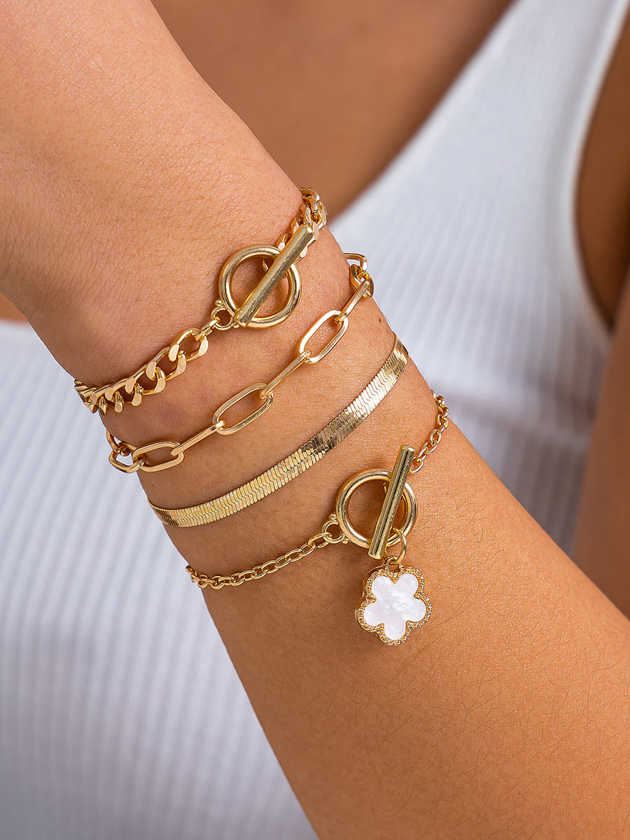 Women's gold snake chain clover charm bracelet — alternate angle