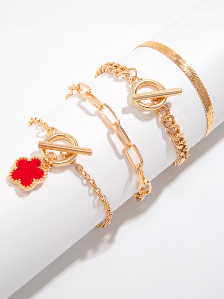 Women's gold snake chain clover charm bracelet — detail