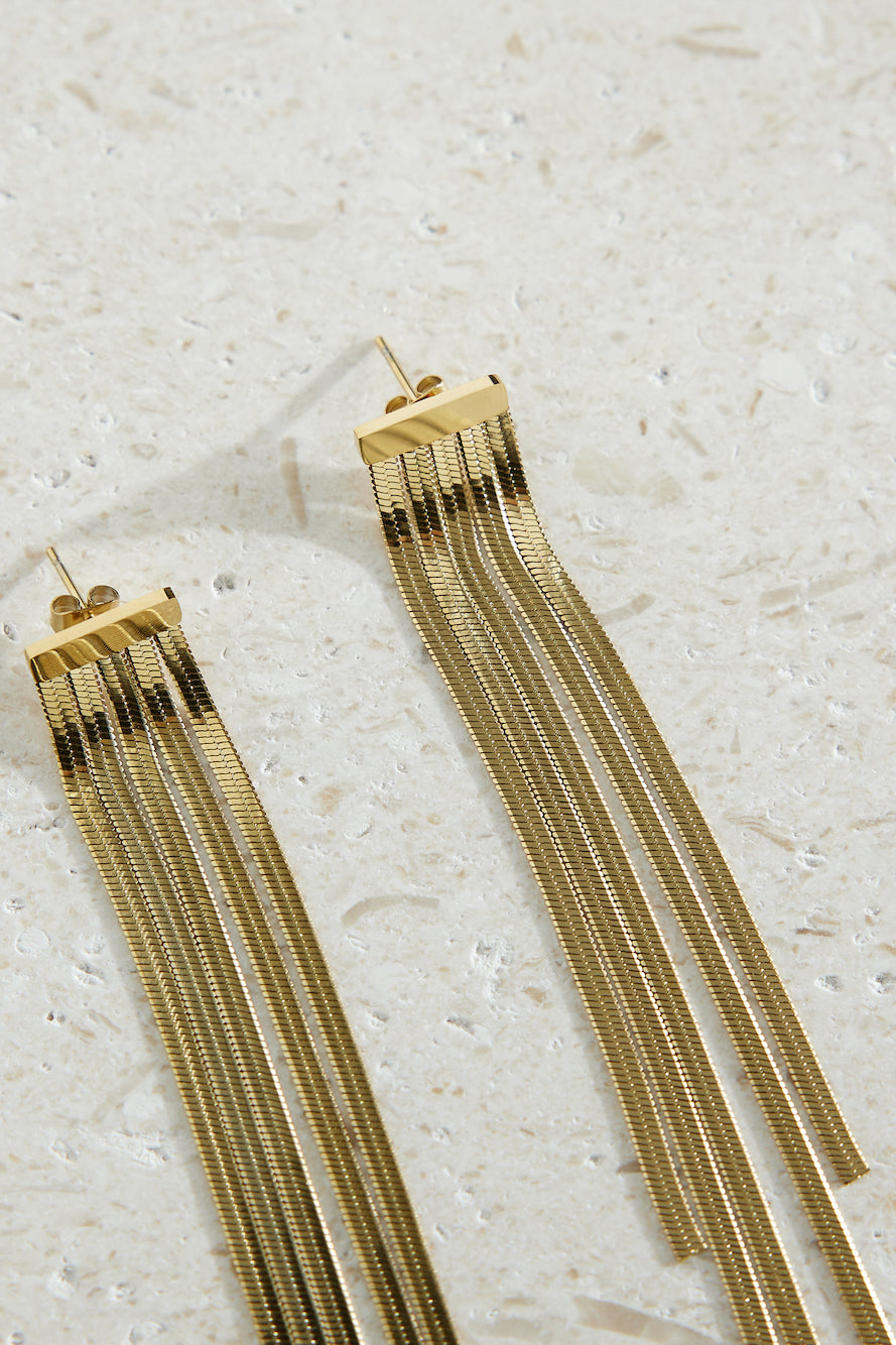 Women's gold snake chain earrings — alternate angle