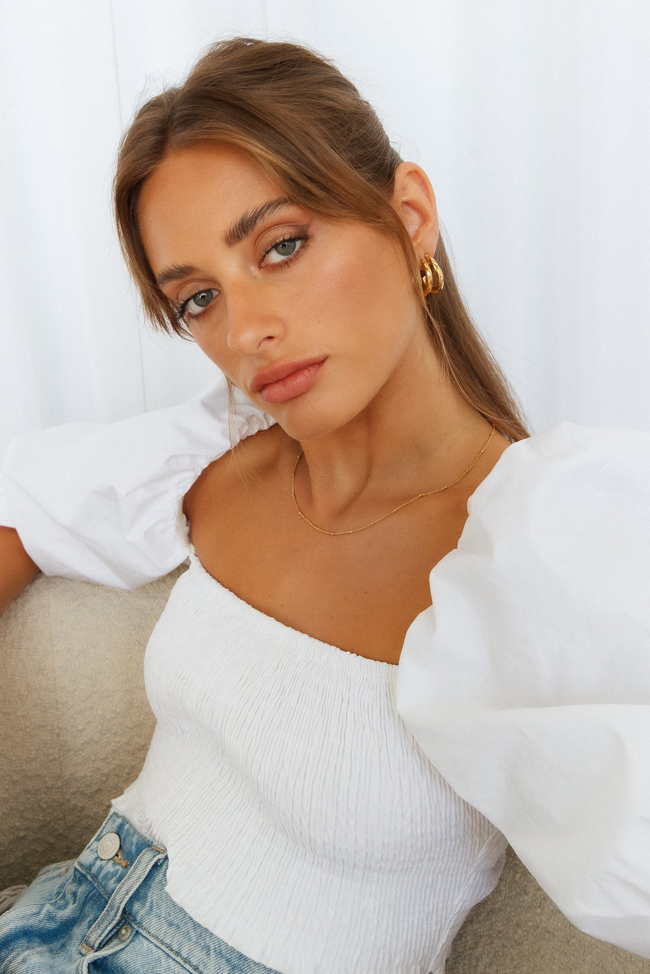 Women's gold staple hoop earrings