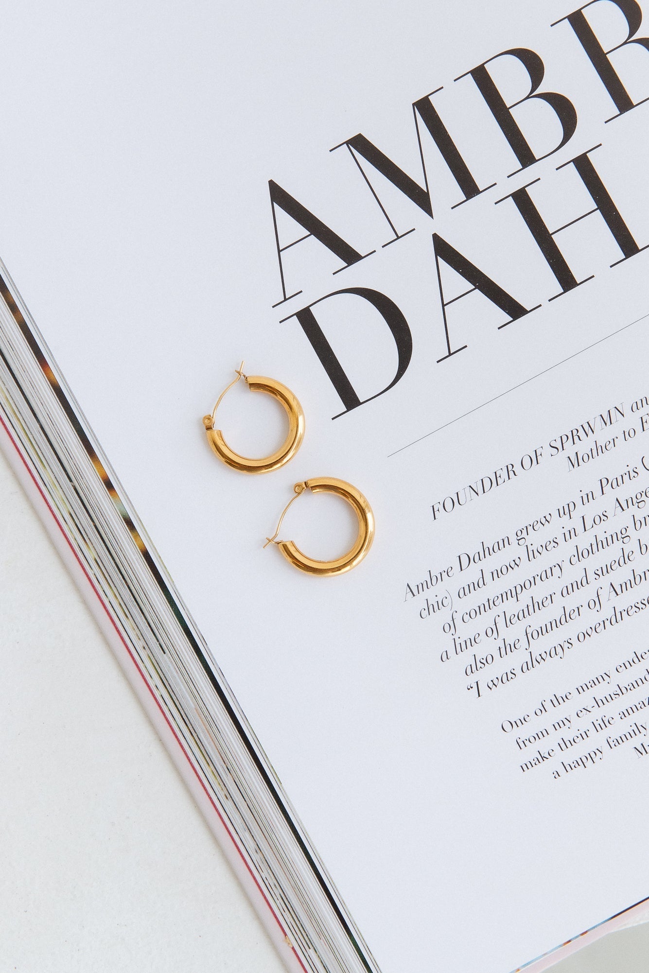 Women's gold staple hoop earrings