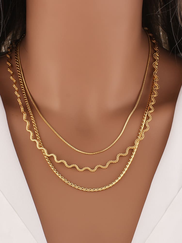 Women's chunky gold textured wave chain necklace — side detail