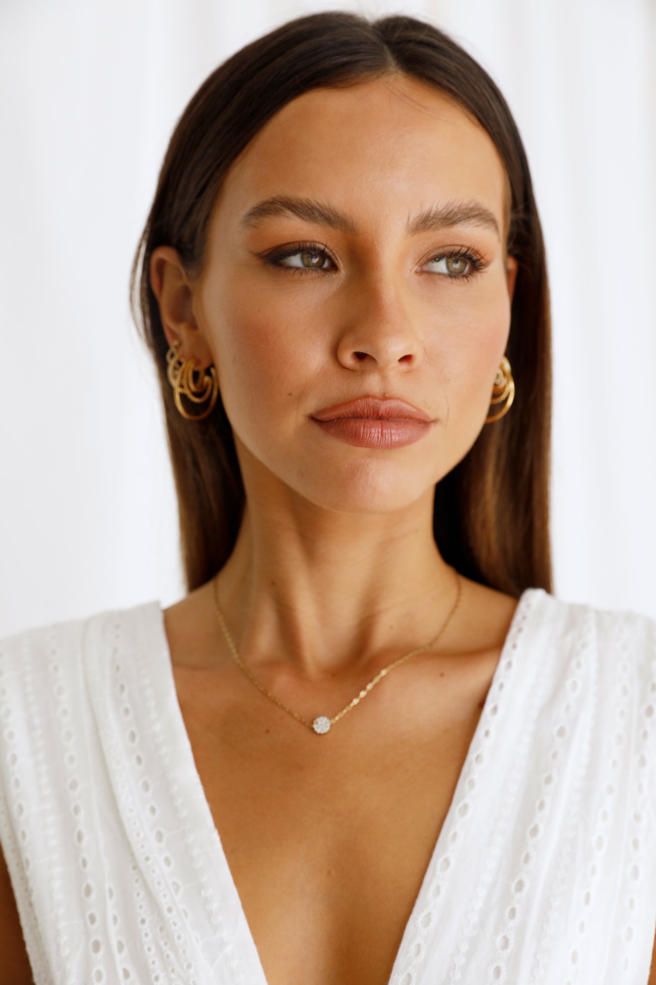 Women's gold triple-layer hoop earrings