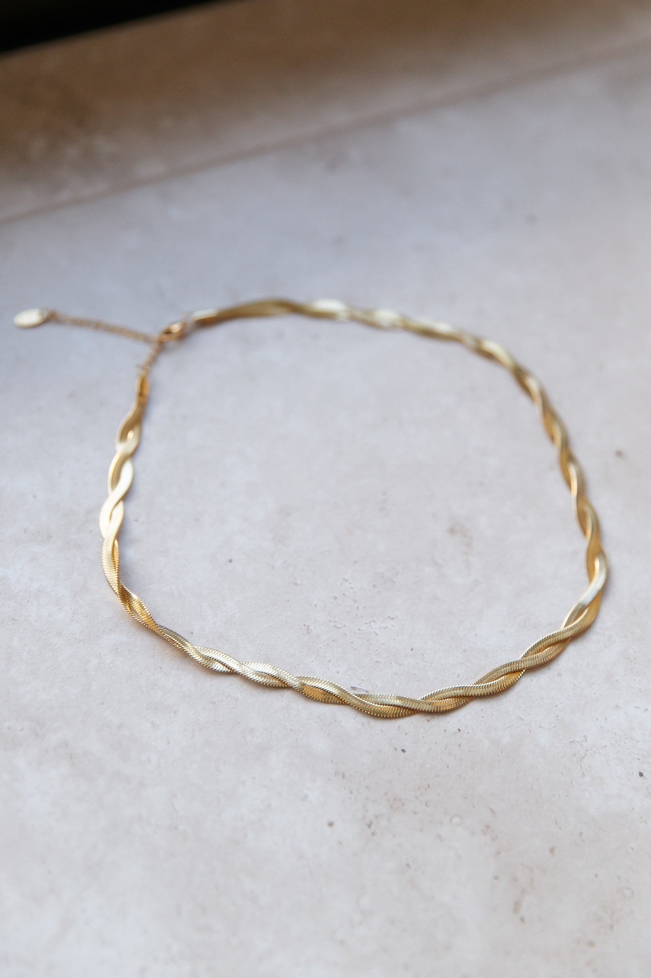 Women's gold twisted chain choker necklace — alternate angle