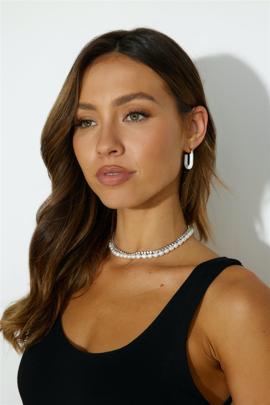 Women's gold white-tone open hoop earrings — alternate angle