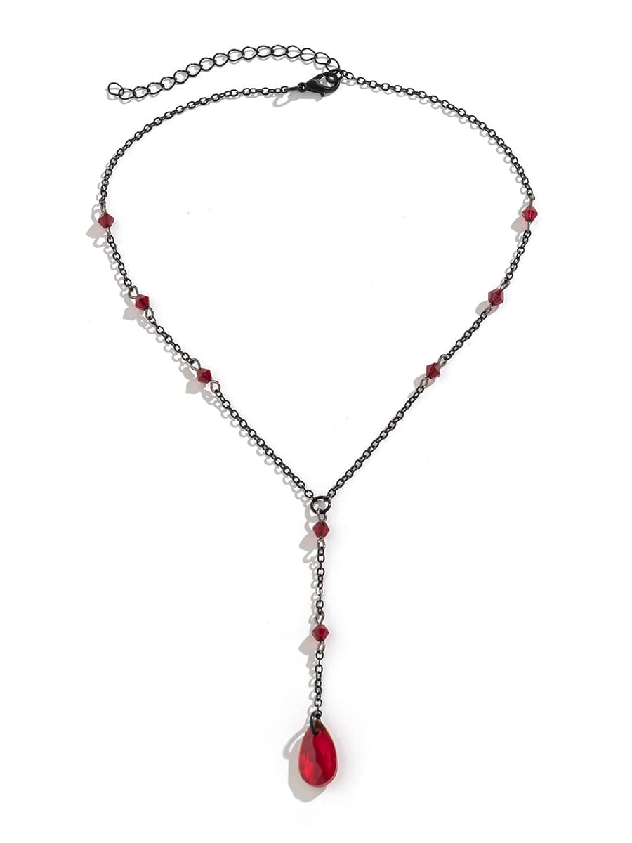 Women's black gothic teardrop crystal necklace — worn