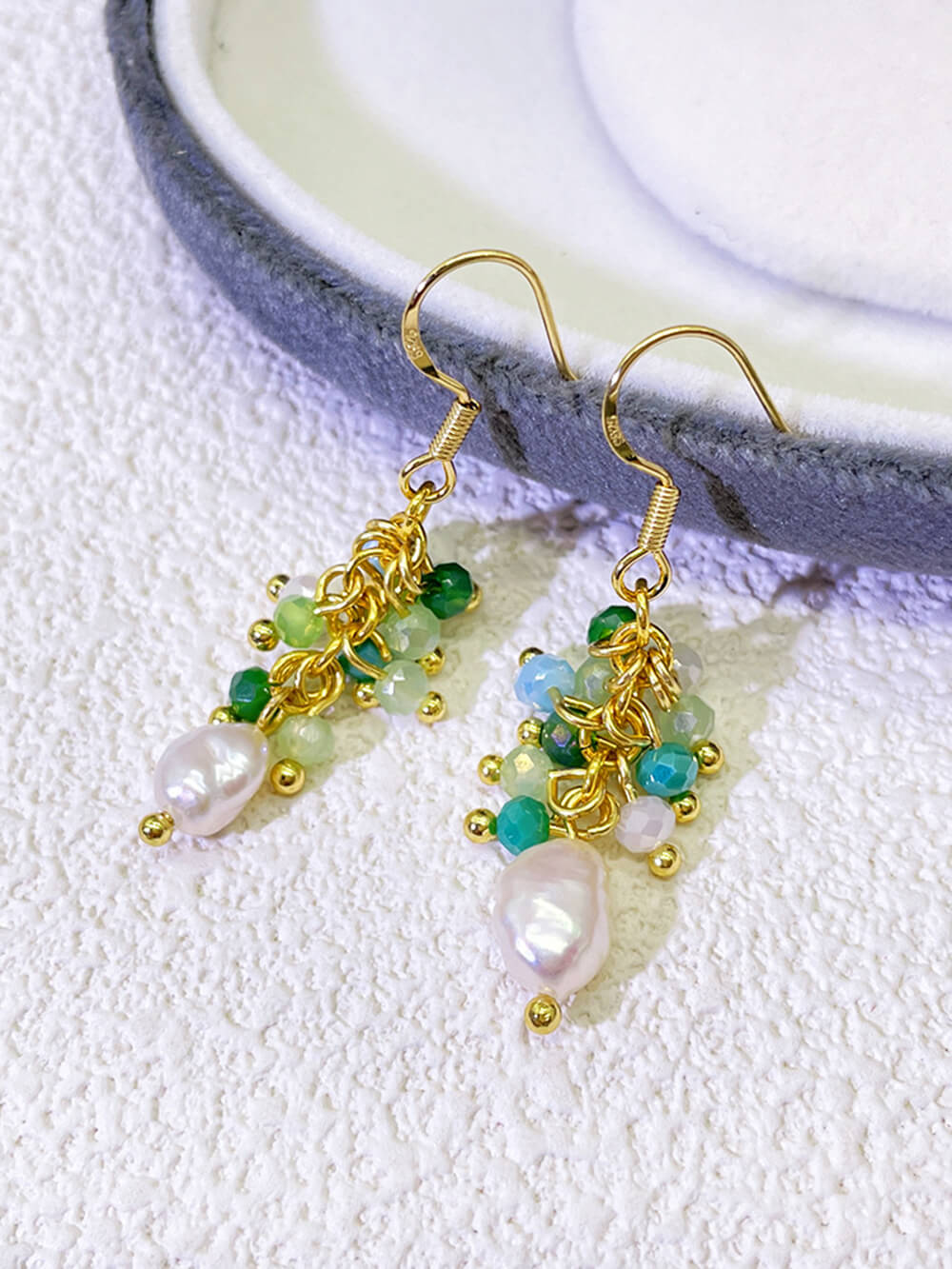 Women's green grape cluster tassel earrings — side detail