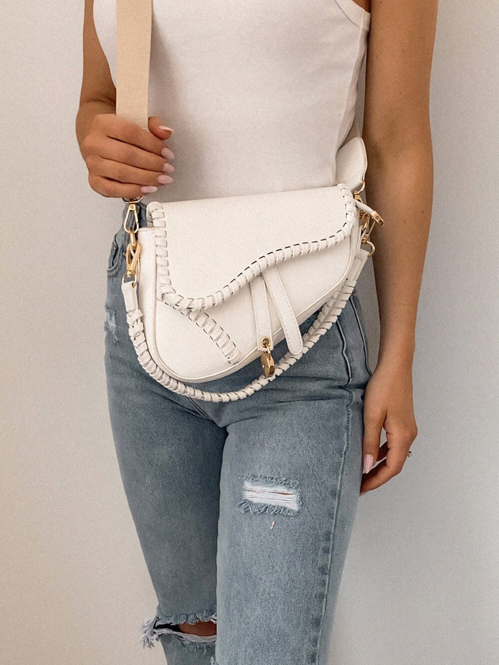 Women's handwoven rattan saddle crossbody bag