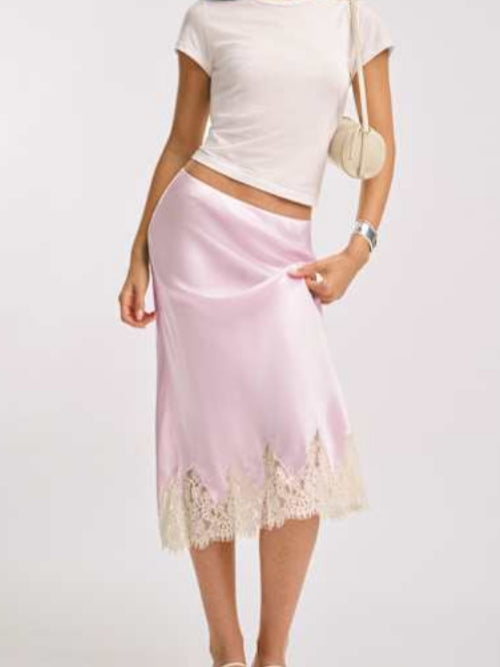Women's lace skirt and knit cardigan co-ord set — back view