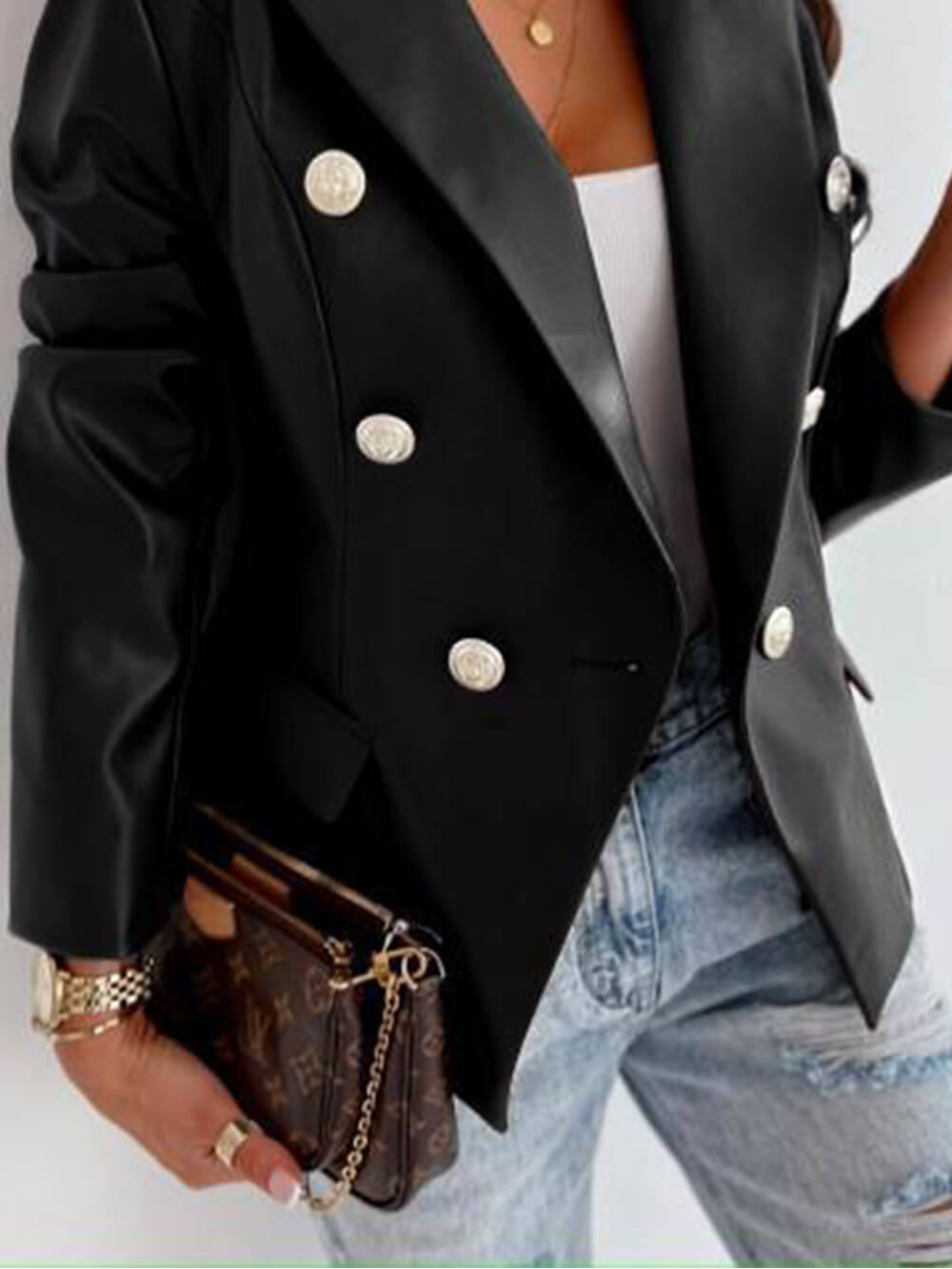 Women's double-breasted leather moto jacket with lapel collar — side detail