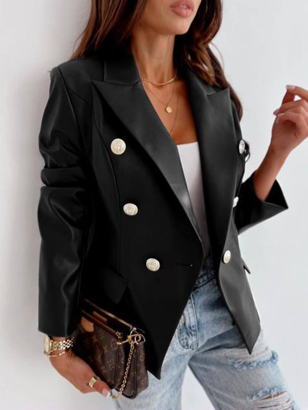 Women's double-breasted leather moto jacket with lapel collar — styled look