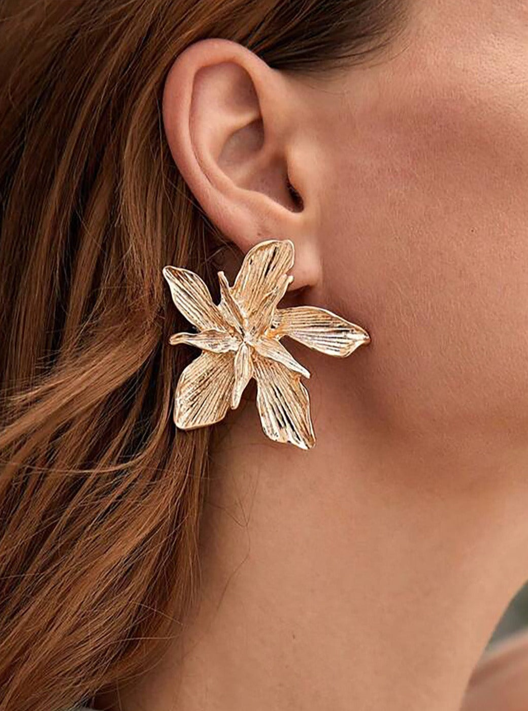 Women's gold metal flower earrings