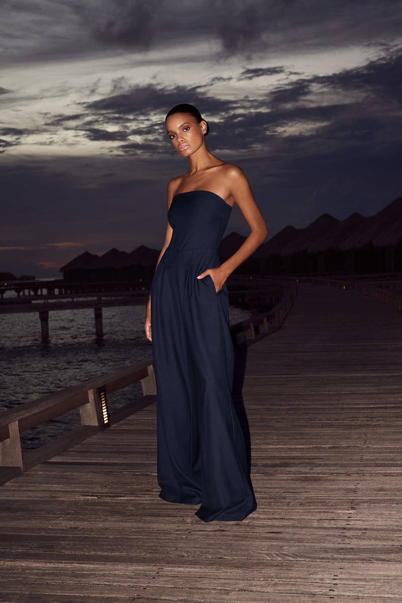Women's navy strapless jumpsuit — styled full length