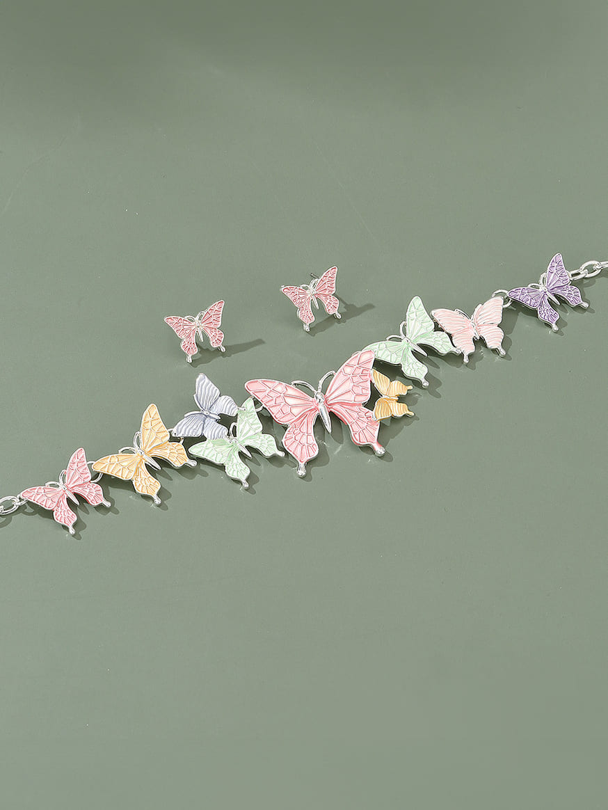 Women's pastel enamel butterfly charm necklace — alternate angle