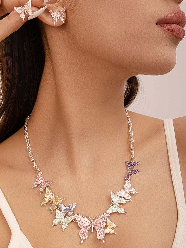 Women's pastel enamel charm necklace — worn detail