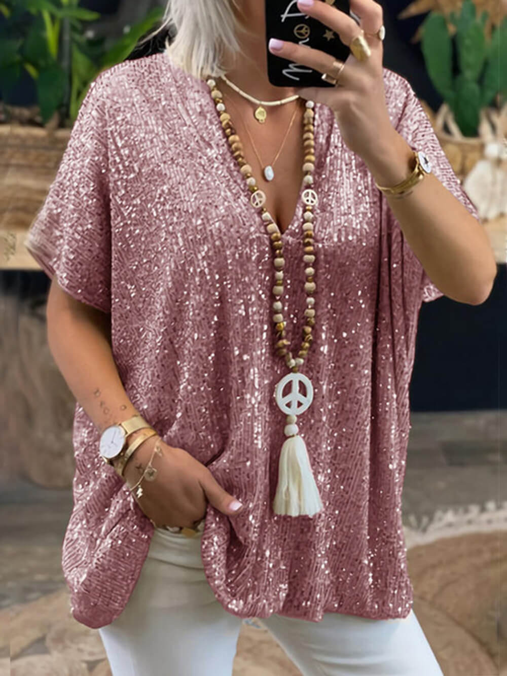 Women's pink sequin top — detail view