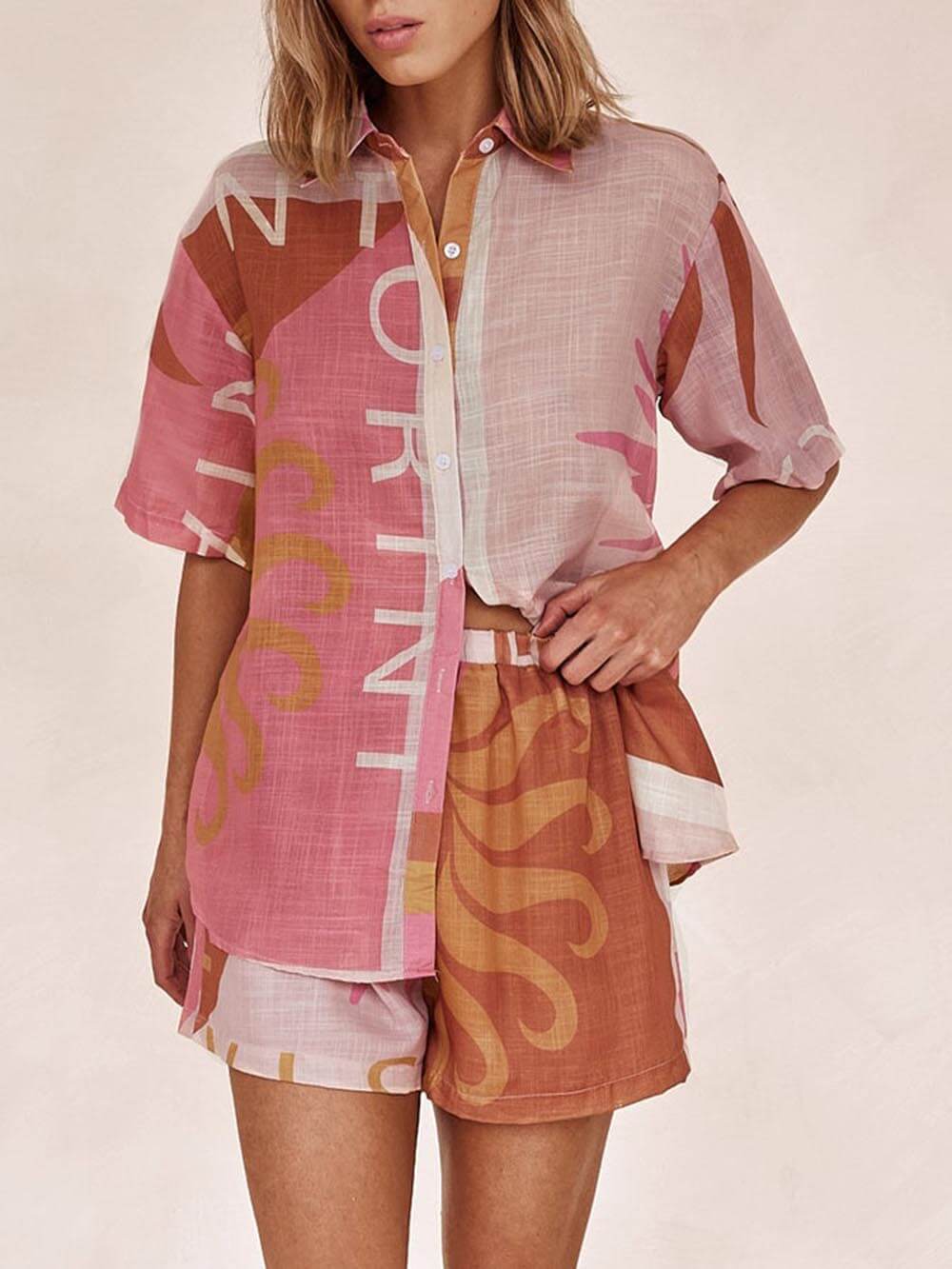 Women's pink sun print vacation shirt and shorts set